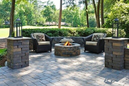 Custom fire pit in the outdoor area of a home in Pelham, NH