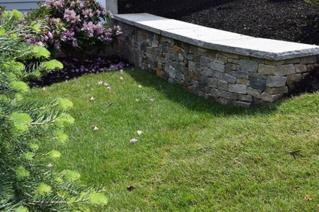 Sturdy retaining walls in a beautiful Pelham, NH, home yard