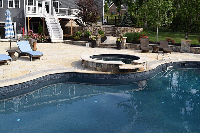 Stylish and modern, the resurfaced pool deck of a Pelham, NH, home